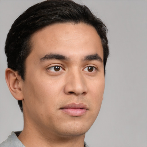 Neutral white young-adult male with short  black hair and brown eyes