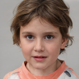 Joyful white child female with medium  brown hair and grey eyes