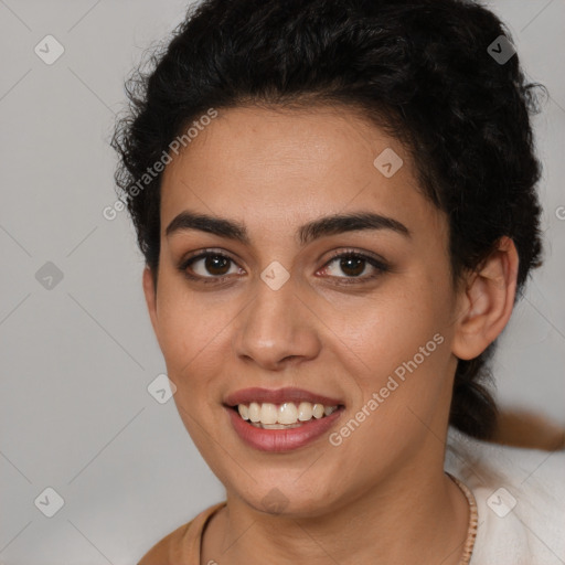 Joyful white young-adult female with short  brown hair and brown eyes