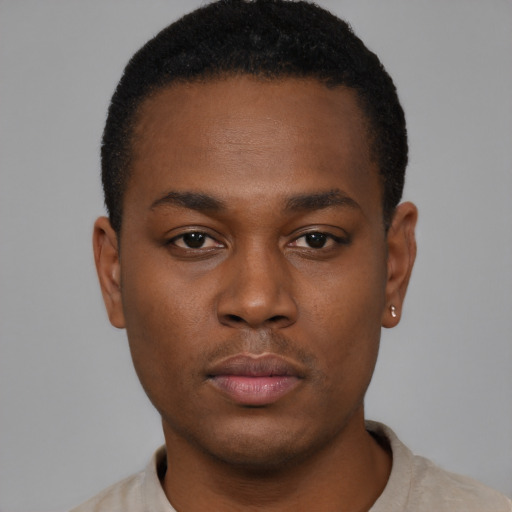 Neutral black young-adult male with short  black hair and brown eyes