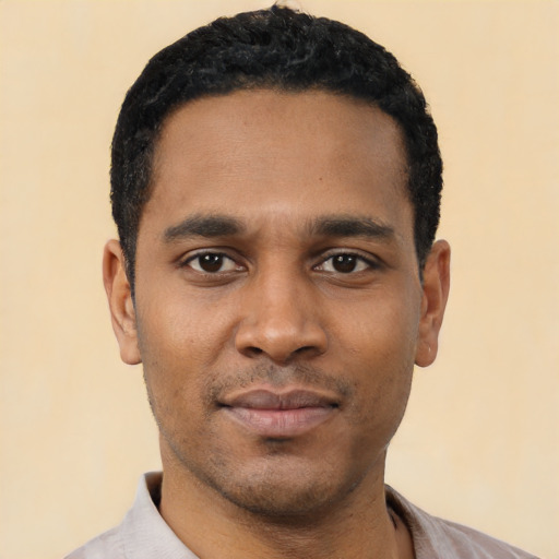 Neutral latino young-adult male with short  black hair and brown eyes
