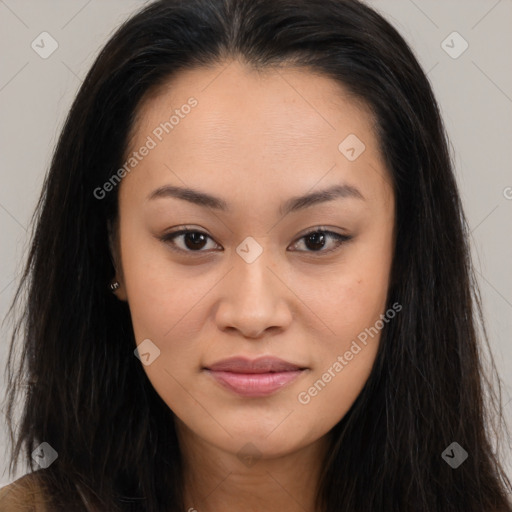 Joyful asian young-adult female with long  brown hair and brown eyes