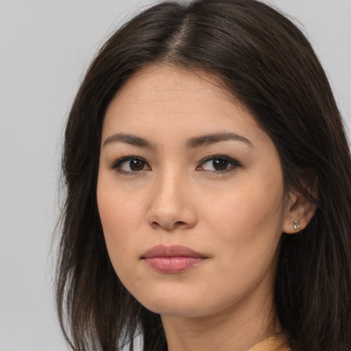 Neutral asian young-adult female with long  brown hair and brown eyes