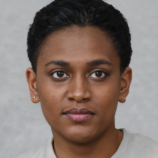Neutral black young-adult female with short  black hair and brown eyes
