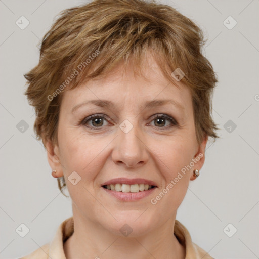 Joyful white adult female with short  brown hair and grey eyes