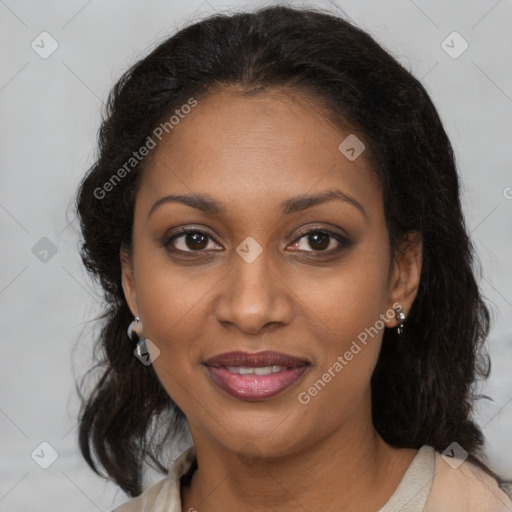 Joyful black young-adult female with long  brown hair and brown eyes