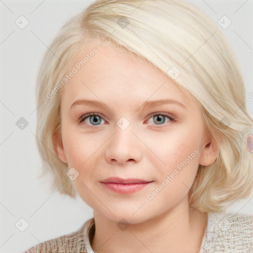 Joyful white child female with medium  blond hair and blue eyes