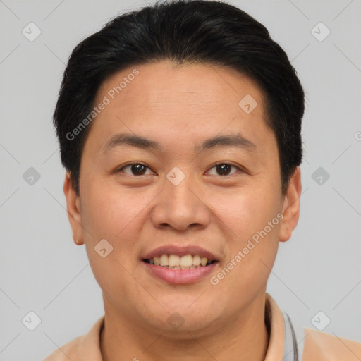 Joyful asian young-adult male with short  brown hair and brown eyes