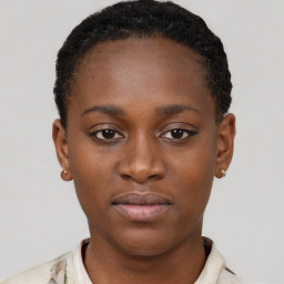 Neutral black young-adult female with short  brown hair and brown eyes