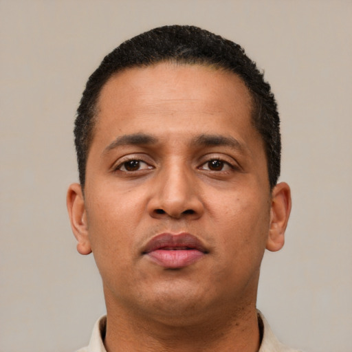 Neutral latino young-adult male with short  brown hair and brown eyes