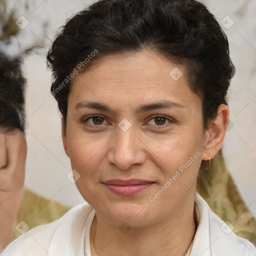 Joyful white adult female with short  brown hair and brown eyes