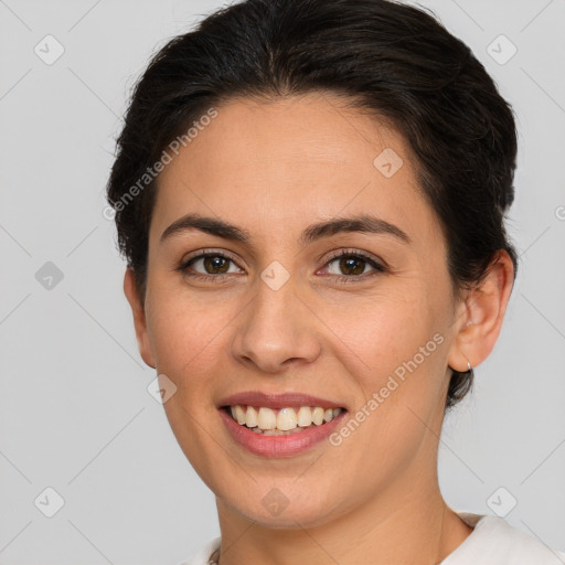 Joyful white young-adult female with short  brown hair and brown eyes