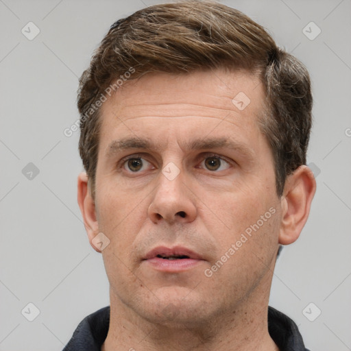 Neutral white adult male with short  brown hair and brown eyes