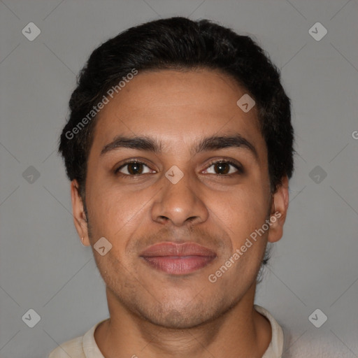 Joyful latino young-adult male with short  brown hair and brown eyes