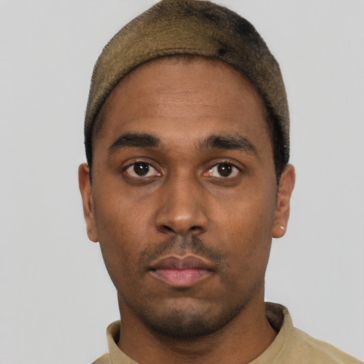 Neutral black young-adult male with short  black hair and brown eyes