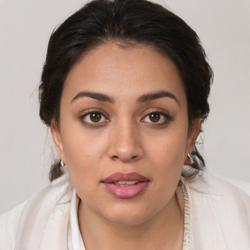 Joyful white young-adult female with medium  brown hair and brown eyes