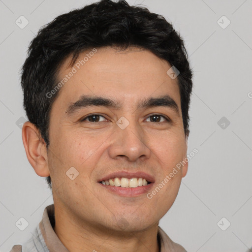 Joyful white young-adult male with short  black hair and brown eyes