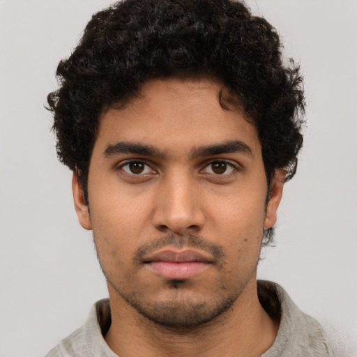 Neutral latino young-adult male with short  brown hair and brown eyes