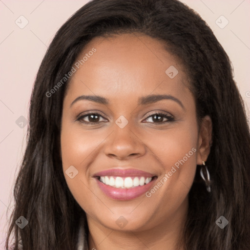 Joyful latino young-adult female with long  brown hair and brown eyes