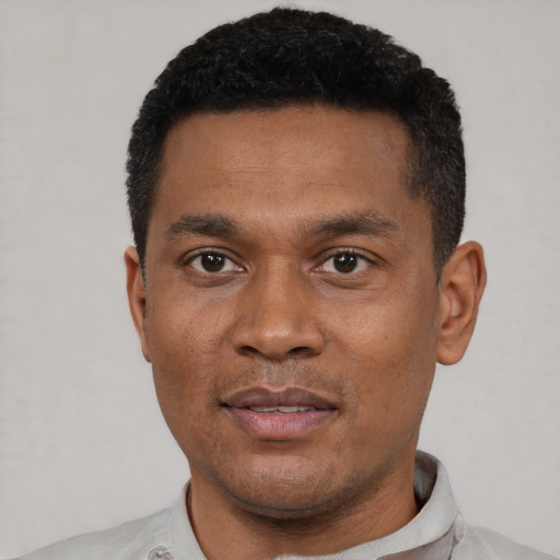 Neutral black young-adult male with short  black hair and brown eyes