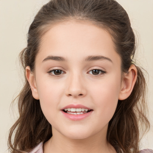 Joyful white child female with medium  brown hair and brown eyes