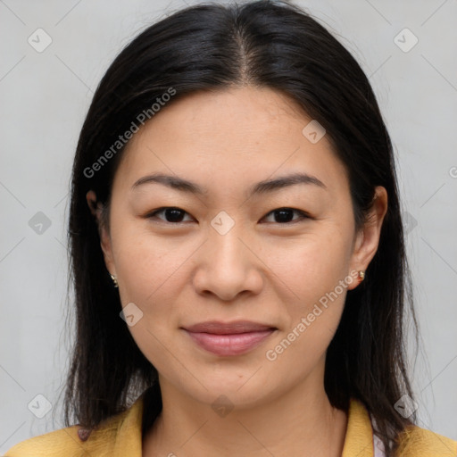 Joyful asian young-adult female with medium  brown hair and brown eyes