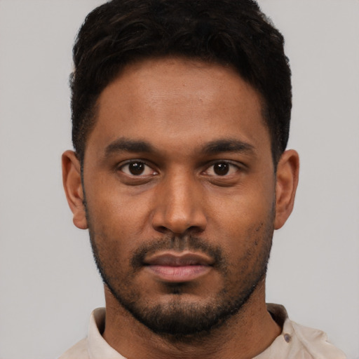 Neutral latino young-adult male with short  black hair and brown eyes