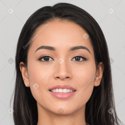 Joyful white young-adult female with long  black hair and brown eyes