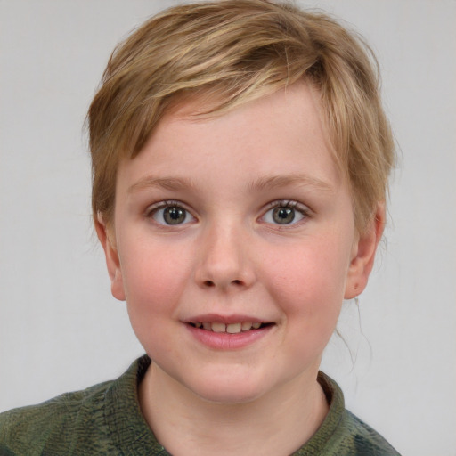 Joyful white child female with short  brown hair and blue eyes