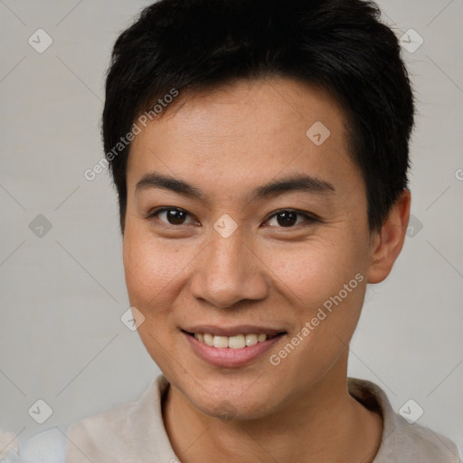 Joyful asian young-adult female with short  brown hair and brown eyes