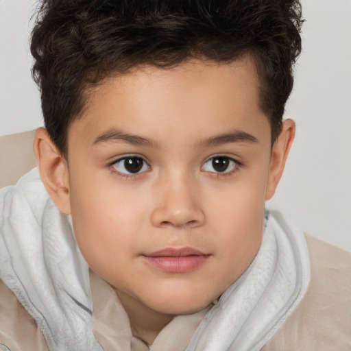 Joyful white child female with short  brown hair and brown eyes