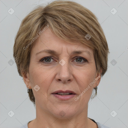 Joyful white adult female with medium  brown hair and grey eyes