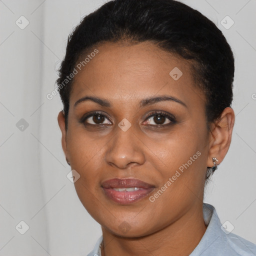 Joyful latino young-adult female with short  brown hair and brown eyes