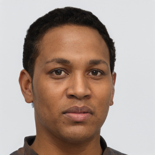 Neutral black young-adult male with short  black hair and brown eyes