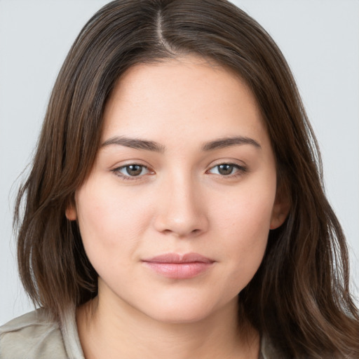 Neutral white young-adult female with medium  brown hair and brown eyes