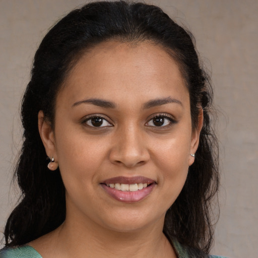 Joyful white young-adult female with medium  brown hair and brown eyes