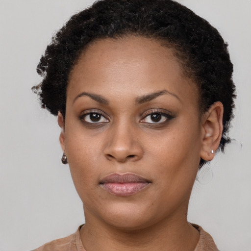 Neutral black young-adult female with short  brown hair and brown eyes