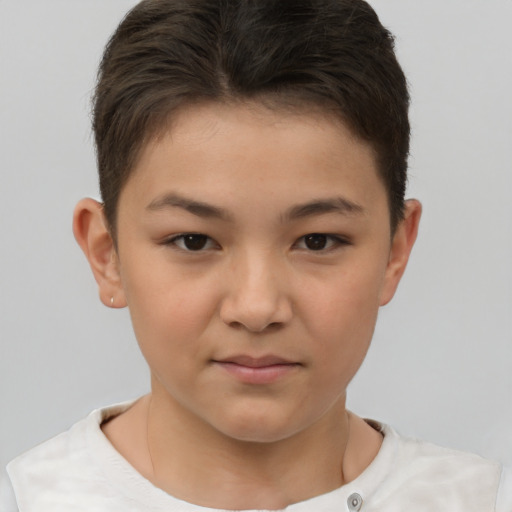 Joyful white child female with short  brown hair and brown eyes