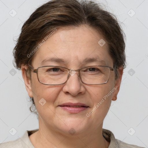 Joyful white adult female with short  brown hair and grey eyes