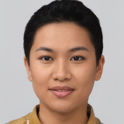 Joyful asian young-adult female with short  black hair and brown eyes