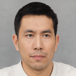 Neutral asian young-adult male with short  black hair and brown eyes