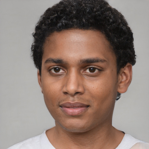 Neutral black young-adult male with short  black hair and brown eyes