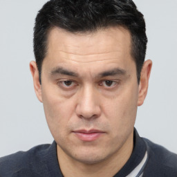 Neutral white adult male with short  brown hair and brown eyes