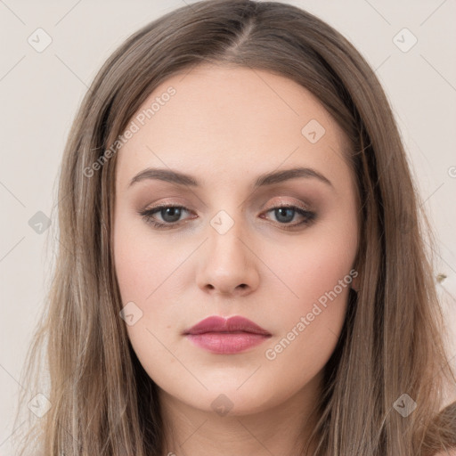 Neutral white young-adult female with long  brown hair and brown eyes