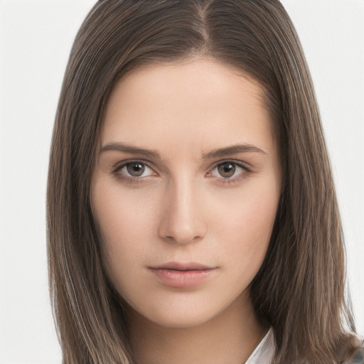 Neutral white young-adult female with long  brown hair and brown eyes