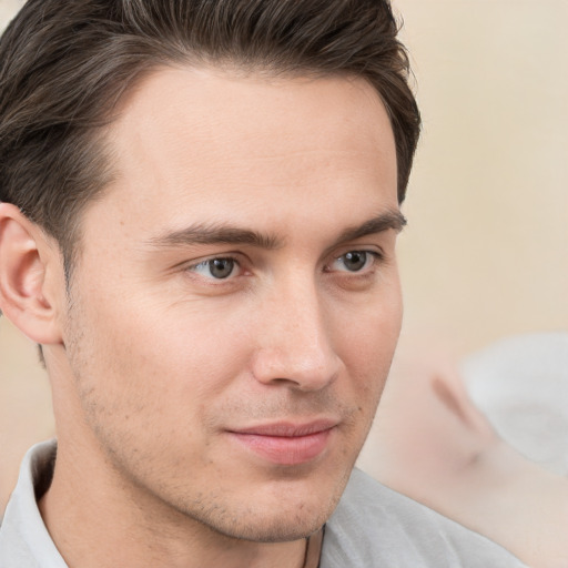 Neutral white young-adult male with short  brown hair and brown eyes