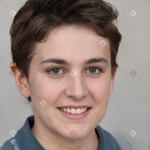 Joyful white young-adult female with short  brown hair and grey eyes