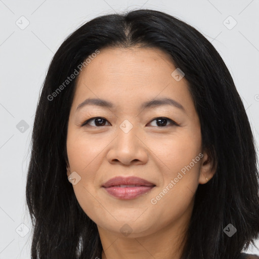 Joyful asian young-adult female with long  brown hair and brown eyes