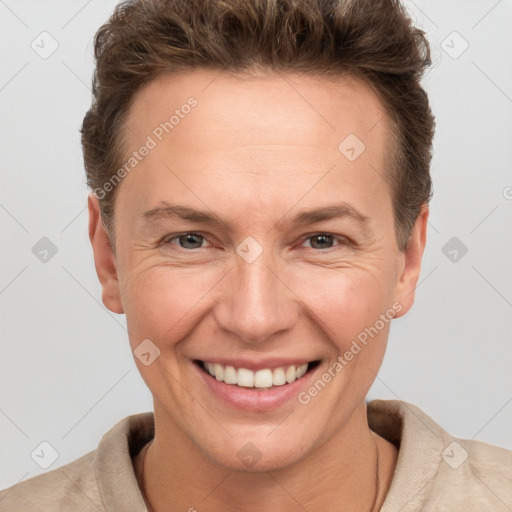 Joyful white adult female with short  brown hair and brown eyes