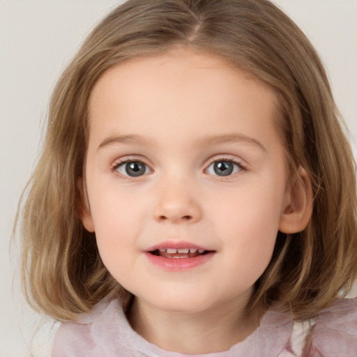 Joyful white child female with medium  brown hair and blue eyes